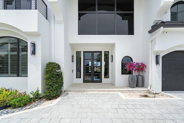 doorway to property featuring french doors