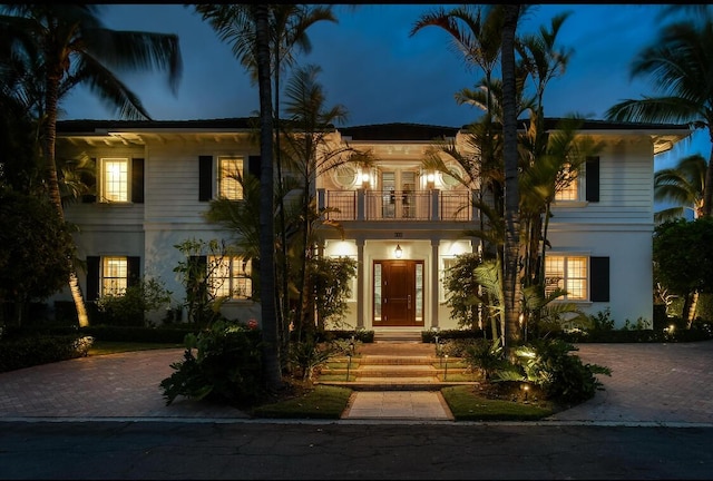 mediterranean / spanish-style house with a balcony