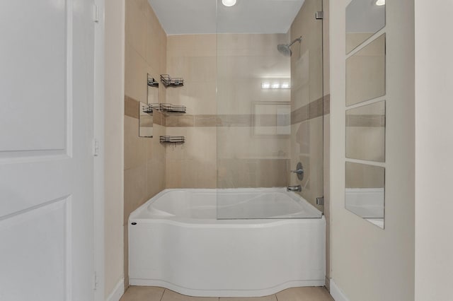 bathroom featuring washtub / shower combination and tile patterned floors