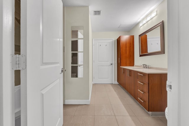 bathroom featuring vanity and tile patterned floors