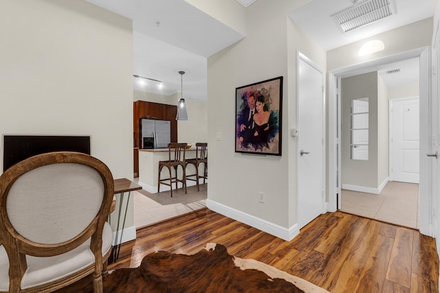 hallway featuring light hardwood / wood-style floors