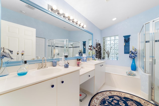 bathroom featuring tile patterned floors, vanity, lofted ceiling, and plus walk in shower