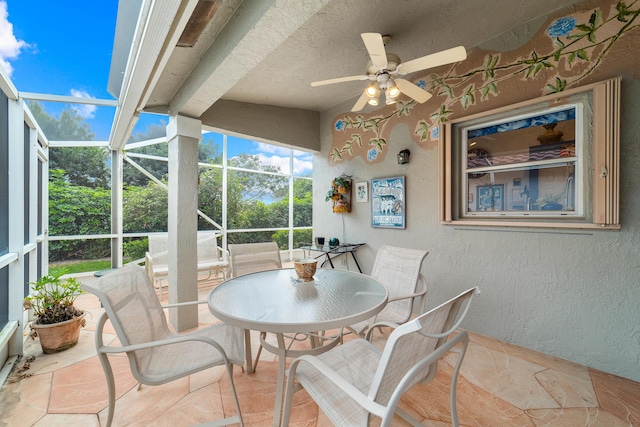 sunroom / solarium with ceiling fan