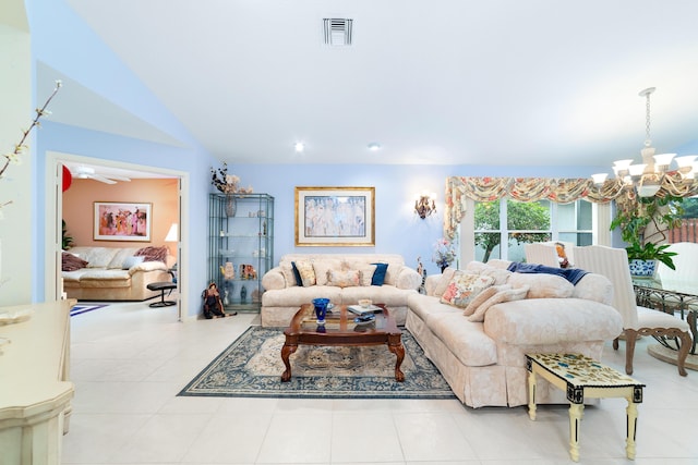 living room with a notable chandelier and vaulted ceiling