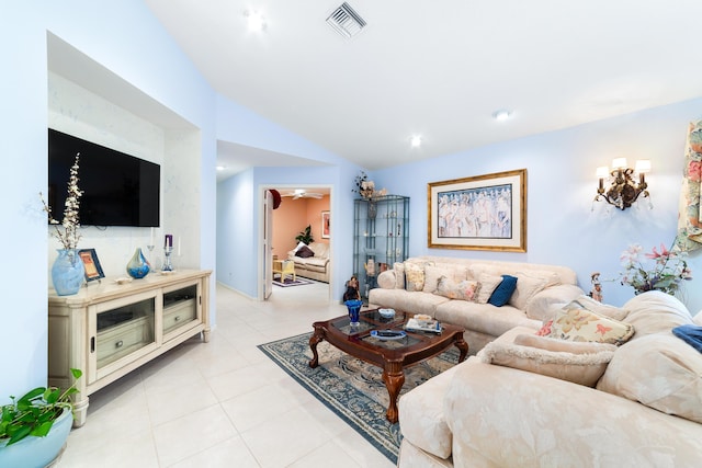 tiled living room with high vaulted ceiling