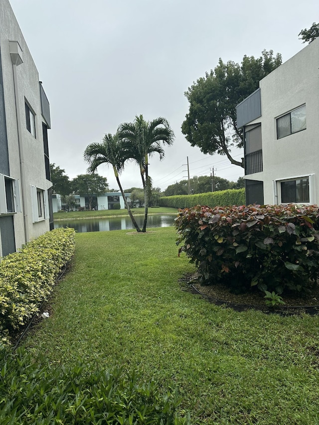 view of yard with a water view