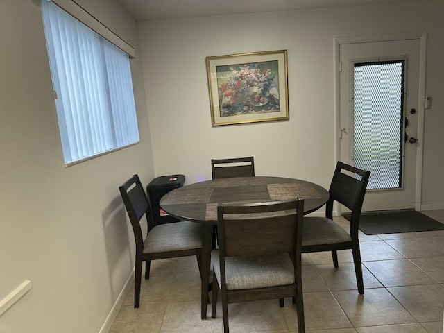 dining room with light tile patterned floors