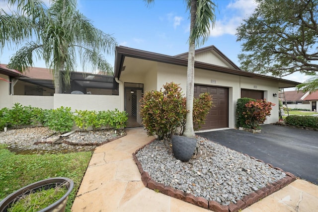 single story home with a garage