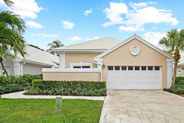 view of front of property featuring a garage