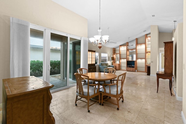 dining area with a chandelier and high vaulted ceiling