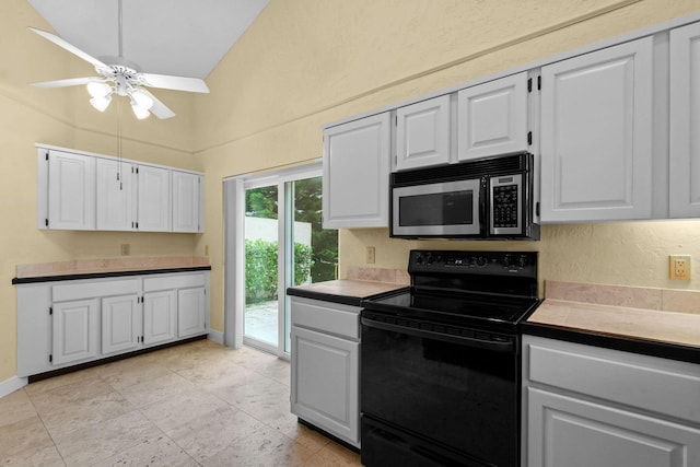 kitchen featuring white cabinetry, black range with electric cooktop, and ceiling fan