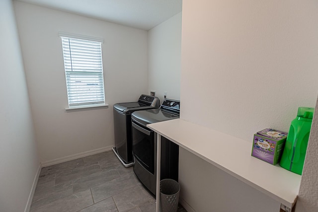 laundry room featuring washer and clothes dryer