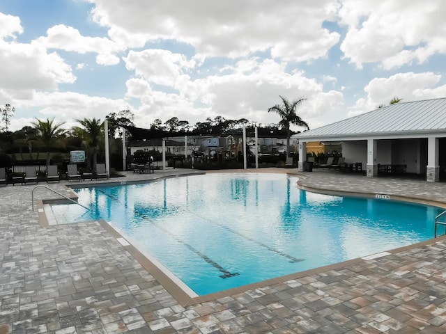 view of pool with a patio area