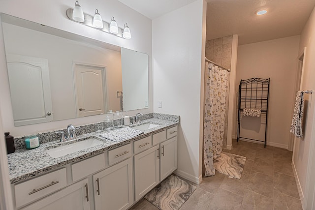 bathroom featuring vanity and a shower with curtain