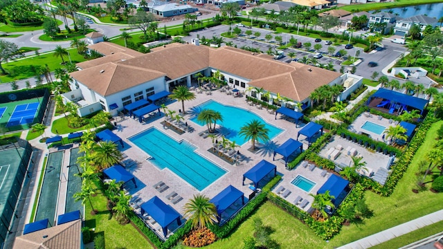 birds eye view of property with a residential view