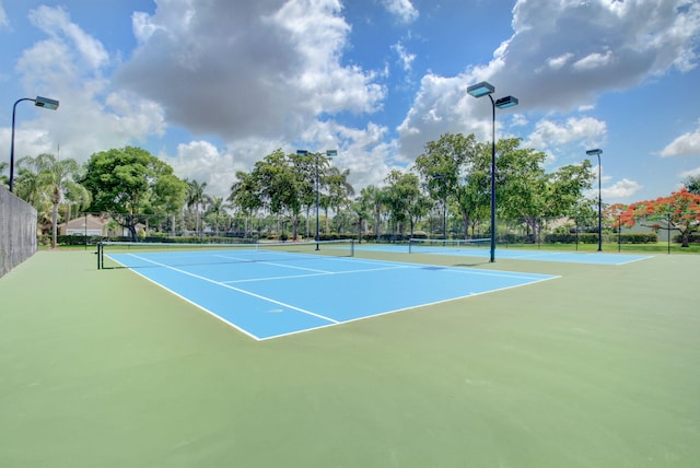 view of sport court featuring basketball hoop