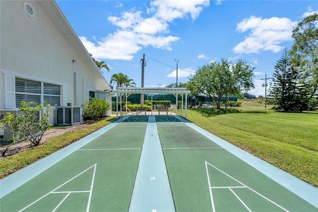 view of home's community featuring a lawn and a pergola