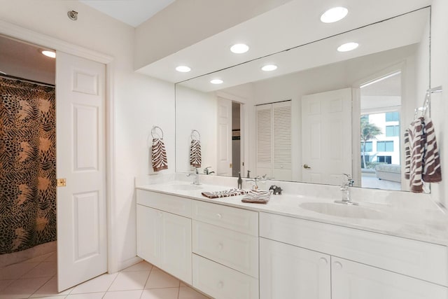 bathroom with vanity and tile patterned floors