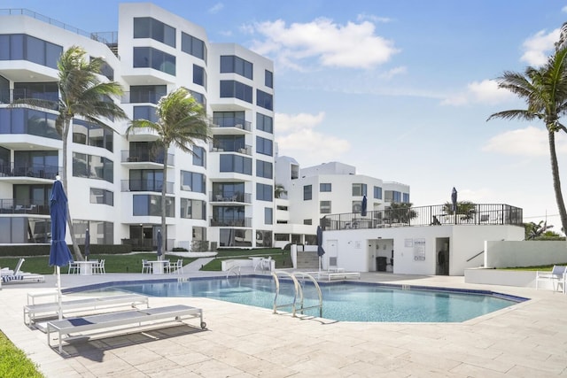 view of pool featuring a patio