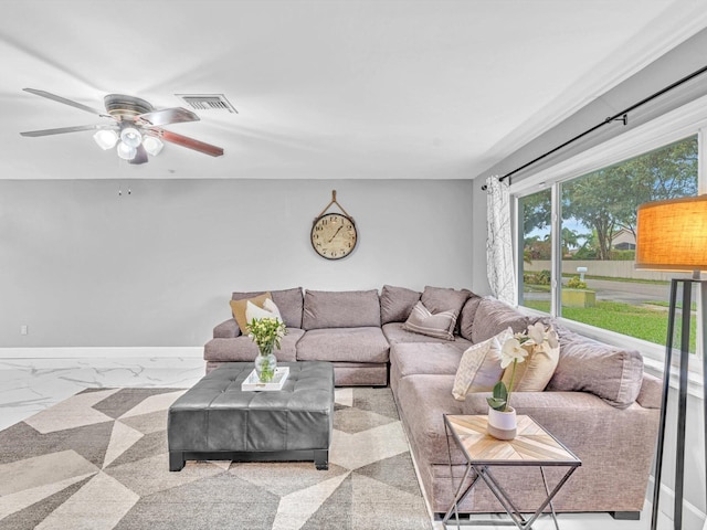 living room featuring ceiling fan