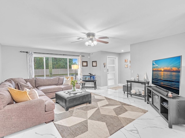 living room featuring ceiling fan