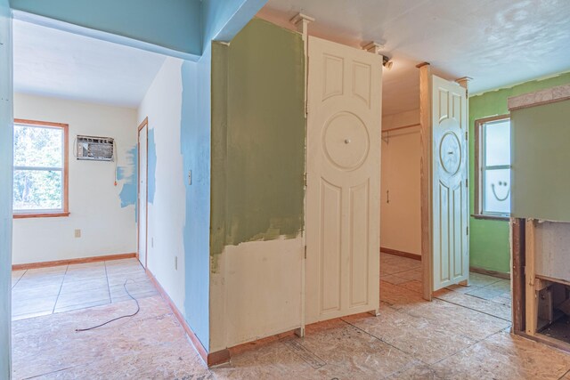 hall with dark wood-type flooring