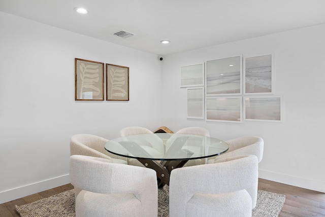 dining area featuring hardwood / wood-style flooring