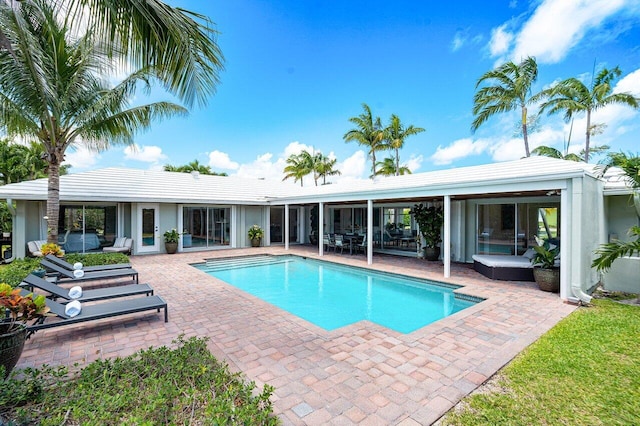 view of pool featuring a patio