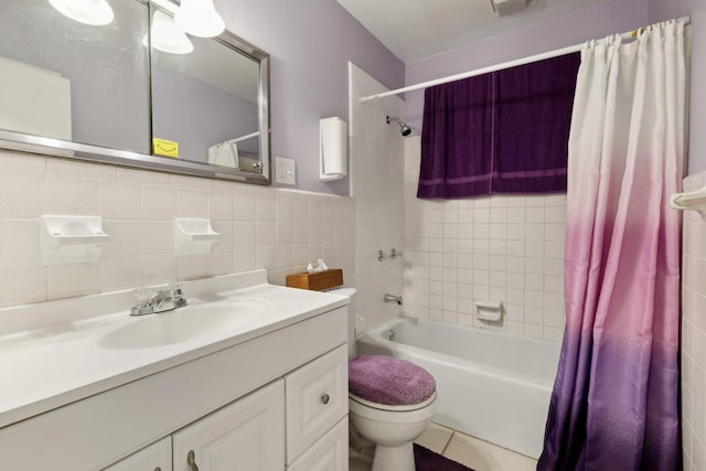 full bathroom with shower / bathtub combination with curtain, vanity, backsplash, tile walls, and toilet