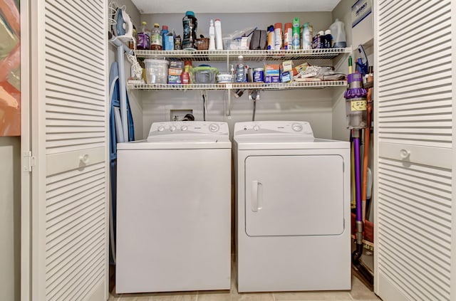 laundry area featuring washing machine and dryer