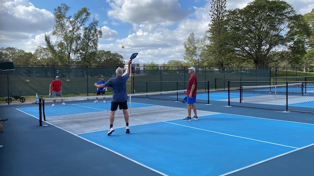 view of tennis court with basketball court