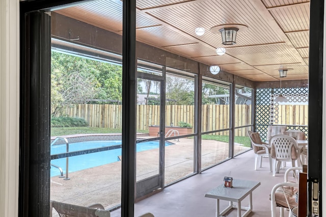 sunroom / solarium with wooden ceiling