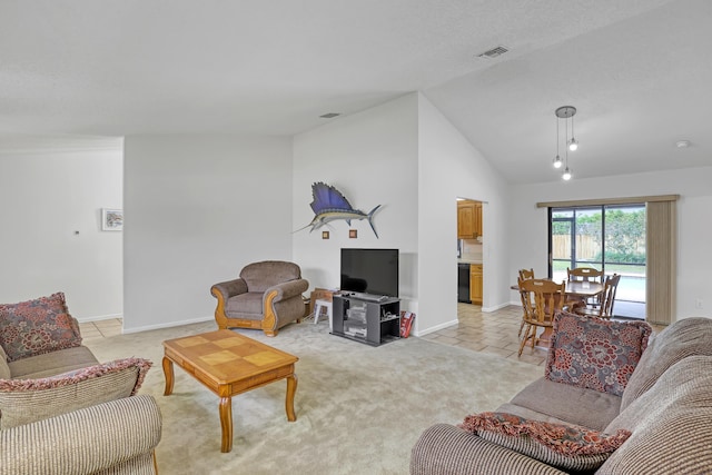 living area featuring lofted ceiling, visible vents, light carpet, and baseboards