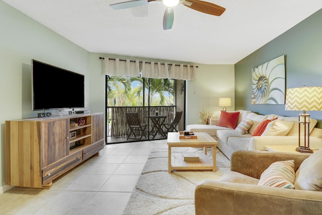 living room featuring ceiling fan and light tile patterned floors