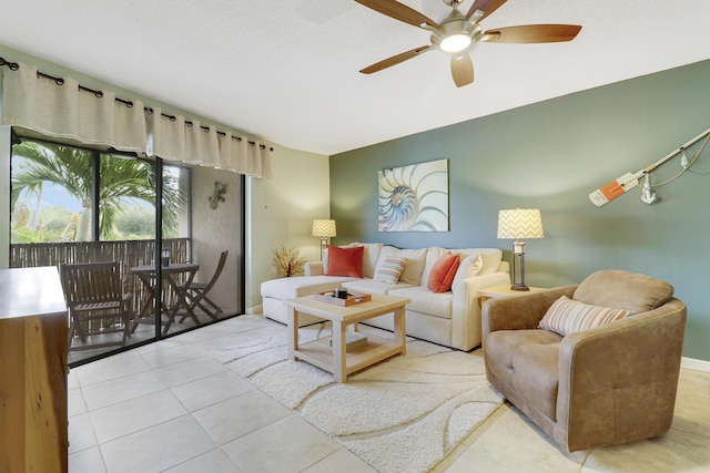 tiled living room with ceiling fan