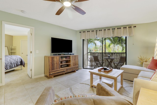 living room with ceiling fan and light tile patterned floors