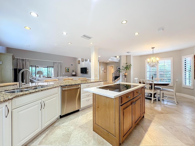 kitchen featuring sink, a kitchen island with sink, black electric stovetop, white cabinets, and stainless steel dishwasher