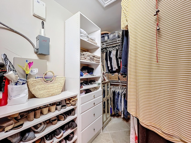 walk in closet featuring light tile patterned floors