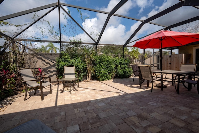 view of patio with a lanai