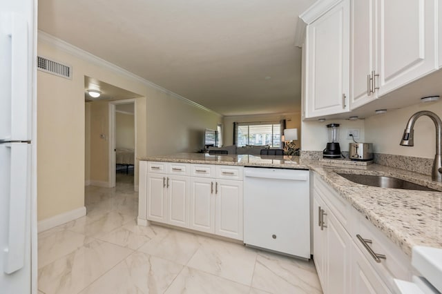 kitchen with white appliances, white cabinetry, sink, light stone counters, and crown molding