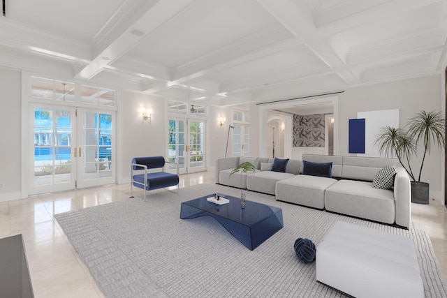 living room featuring french doors, beamed ceiling, crown molding, and coffered ceiling