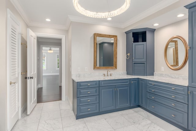 bathroom with vanity and crown molding