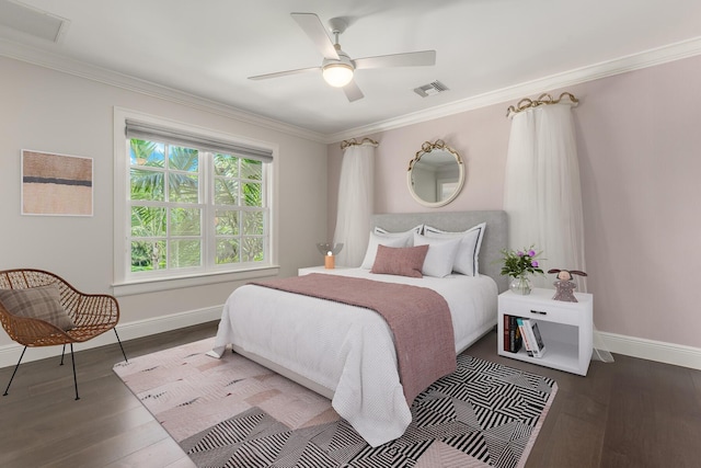 bedroom with ceiling fan, wood-type flooring, and crown molding