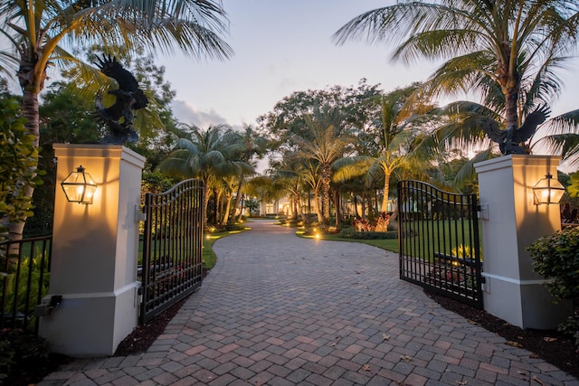 view of gate at dusk