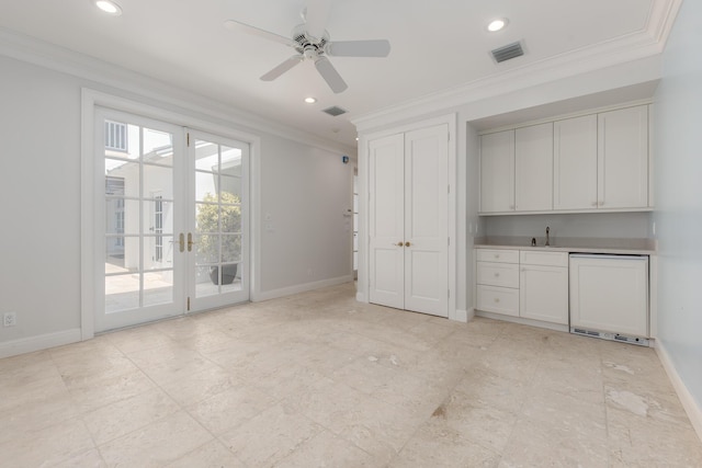 interior space featuring ceiling fan, ornamental molding, and french doors