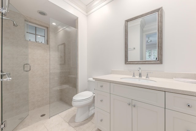 bathroom with toilet, tile patterned flooring, walk in shower, ornamental molding, and vanity