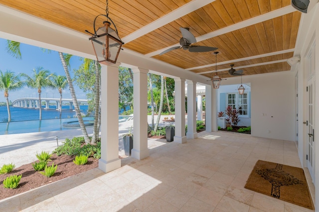 view of patio with ceiling fan