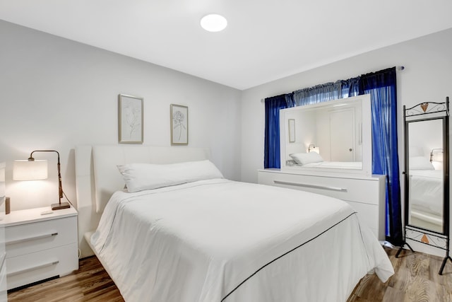 bedroom featuring hardwood / wood-style floors