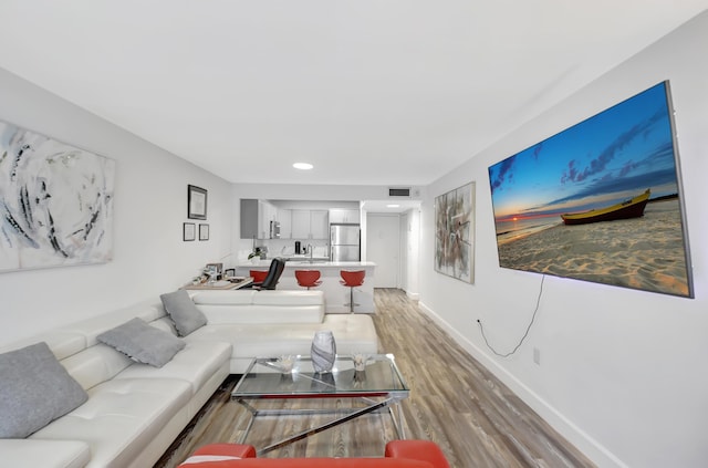 living room with wood-type flooring