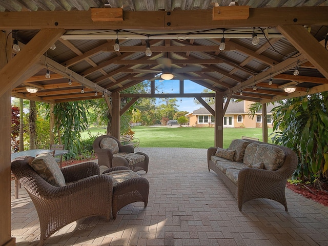 view of patio featuring a gazebo and outdoor lounge area